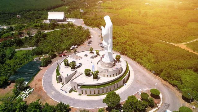 Aerial view of Our lady of Lourdes Virgin Mary catholic religious statue on a Nui Cui mountain in Dong Nai province, Vietnam.