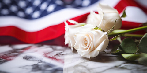 American Flag and White Roses on Marble Table for Memorial Day