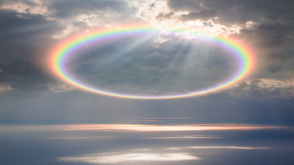Halo is an optical phenomenon that belongs to the  ice-crystal halos - Circular rainbow cloud with amazing sunset