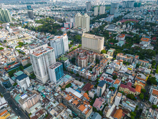 Aerial view of Ho Chi Minh City skyline and skyscrapers in center of heart business at Ho Chi Minh City downtown. Cityscape and many buildings, local houses
