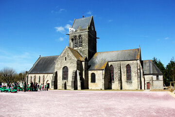 SAINTE-MERE-EGLISE, FRANCE. Parachutist hanging from church, St. Mere Eglise, in Normandy. 