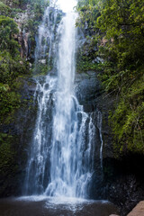 Fototapeta na wymiar Waterfall along the road to Hana