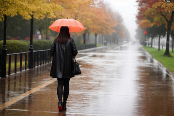 A girl walks through the streets with an umbrella in the rain. Generative AI