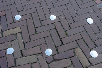 Netherlands, Delft criss cross bricks on the street