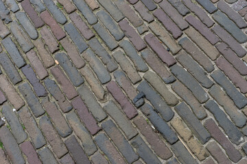 Netherlands, Delft, criss coss red bricks pattern on street