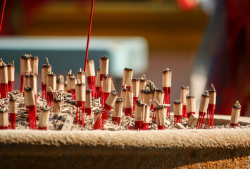 Incense offerings to monks in a pot