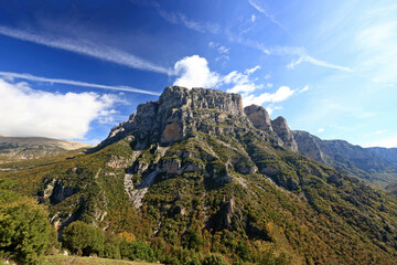 Timfi mountain and the peak of Astraka, at Zagori region, above the village of Papigko, in Ioannina prefecture, Epirus, Greece, Europe.