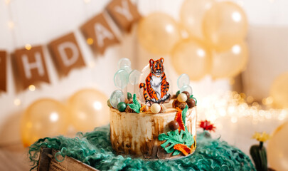 1st birthday cake with safari style togrom