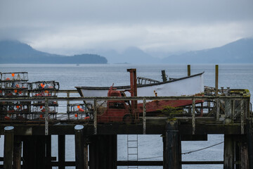 Old wooden Fishermen pier for fishing boats in Hoonah, Icy Strait Point in Alaska