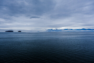 Breathtaking mountain glacier range view of Alaska mountains in Hoonah, Icy Strait Point with...