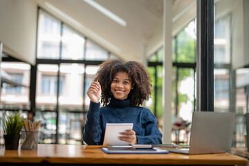 Young business woman sitting work at work space. Design or plan work, contemplate a new project plan