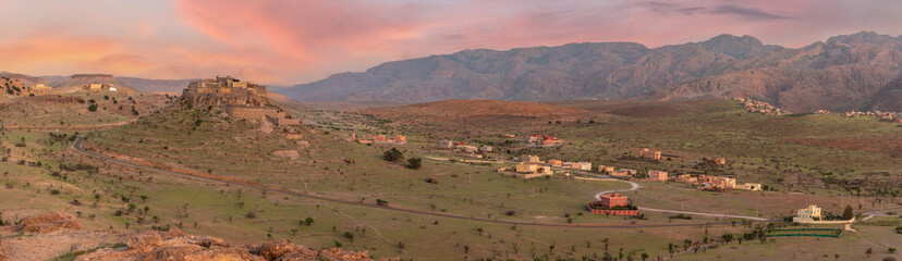 Fototapeta premium Sunset over a beautiful peaceful landscape of the Anti-Atlas mountains near Tirourgane