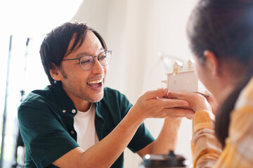 Happy Couple Embracing Their New House planing, Exciting Real Estate Ownership Journey