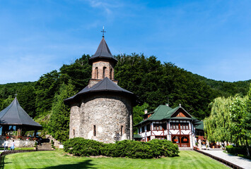 Fototapeta na wymiar Prislop monastery and people on pilgrimage. Hateg, Romania.