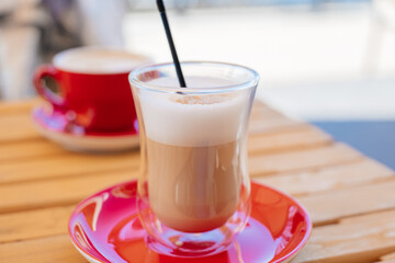 Break and pause to chill. Coffee with milk and foam.	