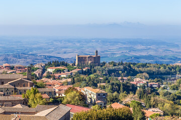 Fototapeta na wymiar Volterra, Italy. Scenic view of the city from the air. Church of Saints Giusto and Clemente