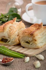 Khari pattice is flaky, and a common breakfast snack in Indian households. Commonly served with masala tea. It has a lot of spice and stuffed with marinated vegetables.