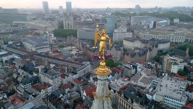 Aerial view of sculpture, top of the Spire of Hotel De Ville, Grand Place, Brussels