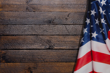 Fototapeta na wymiar USA flag on wood background.