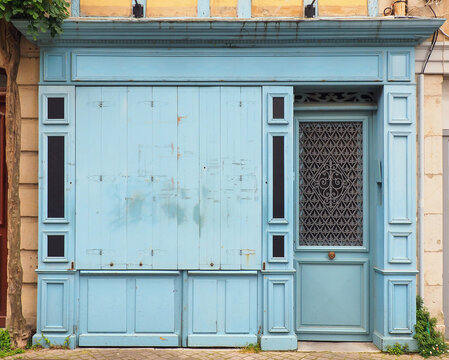 facade of an old abandoned shop in the historic center of the old town of Bayonne, in the heart of the beautiful and green Basque country, in the south-west of France, near the Atlantic coast