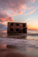 Beautiful and colorful sunset over the Northern forts in the Baltic sea coastline at Karosta (Liepaja, Latvia)