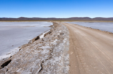 Exploring the huge salt flats Salinas Grandes de Jujuy in northern Argentina while traveling South America 