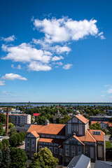 Fototapeta na wymiar Liepaja, Latvia - June 29, 2023: aerial view of the city centre of the Liepaja city with historical buildings and traffic in the city