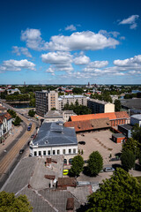 Fototapeta premium Liepaja, Latvia - June 29, 2023: aerial view of the city centre of the Liepaja city with historical buildings and traffic in the city
