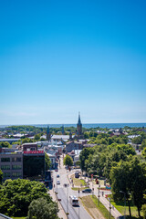 Obraz premium Liepaja, Latvia - June 29, 2023: aerial view of the city centre of the Liepaja city with historical buildings and traffic in the city