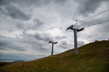 Fototapeta na wymiar Cable car pylons on a hill