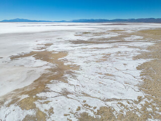 Aerial view of the huge salt flats Salinas Grandes de Jujuy in northern Argentina while traveling...