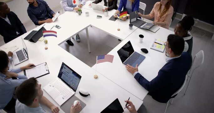 Politician Meeting And Group Discussion With Flags