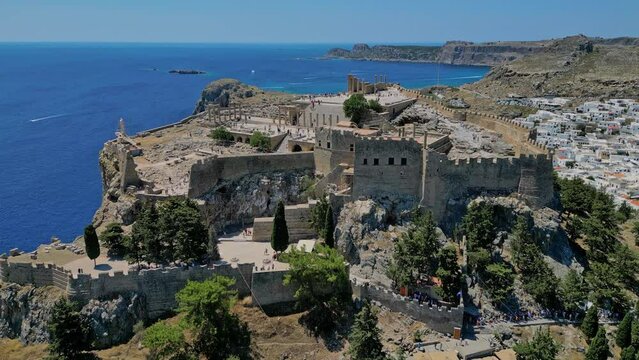 Areal video of old castle on the high cliff.