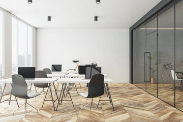 Back view on white work place table and dark chairs on wooden floor in minimalistic interior design coworking office with conference room behind glass partition and white wall background. 3D rendering