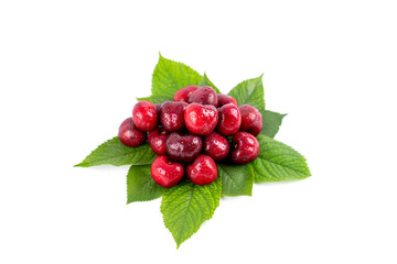 Heap of red sweet cherries on green leaves. Fruits isolated on white background.