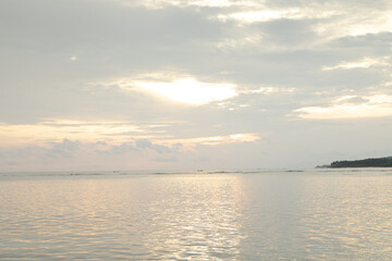 Lombok and Gili Air islands, overcast, cloudy day, sky and sea. Sunset, sand beach.