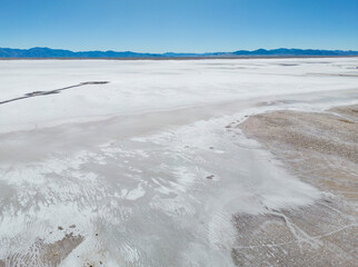 Aerial view of the huge salt flats Salinas Grandes de Jujuy in northern Argentina while traveling...