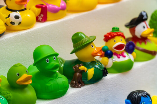 Toy Rubber Ducks With Different Characterizations, On A Store Shelf.