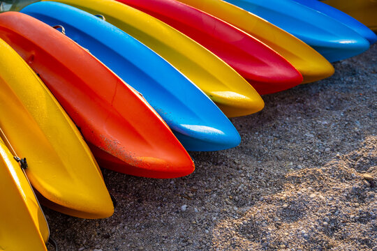 Colorful kayaks on a small stones sand in Turkey