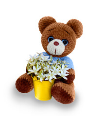 knitted bear with a bucket of flowers on a transparent background