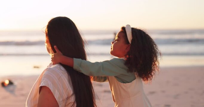 Beach, mom and kid in summer with hair care and smile in nature at sunrise with love and support. Mother, happy and young child on vacation with freedom and youth on holiday with bonding and parent