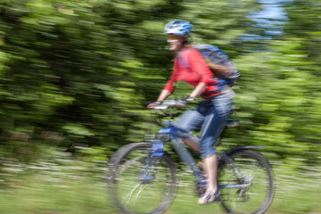 Fototapeta premium young girl on bicycle
