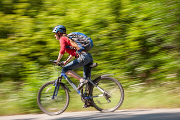 Fototapeta premium young girl on bicycle