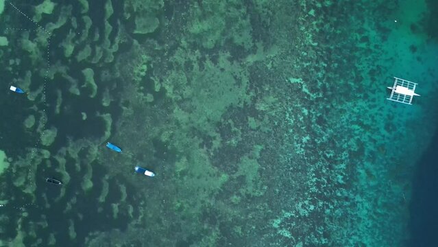 Alona Beach on the island of Vauxhall Pangrao, Philippines, with beautiful beaches and hopping boats (traditional Philippine boats, banca)