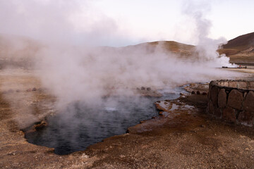 Exploring the fascinating geothermic fields of El Tatio with its steaming geysers and hot pools high up in the Atacama desert in Chile, South America

