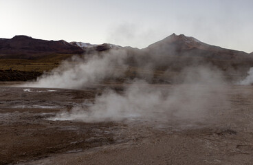 Exploring the fascinating geothermic fields of El Tatio with its steaming geysers and hot pools high up in the Atacama desert in Chile, South America