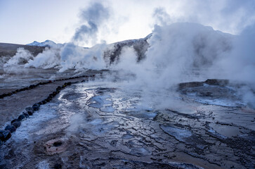 Exploring the fascinating geothermic fields of El Tatio with its steaming geysers and hot pools high up in the Atacama desert in Chile, South America
