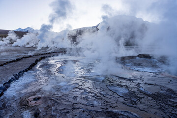 Exploring the fascinating geothermic fields of El Tatio with its steaming geysers and hot pools high up in the Atacama desert in Chile, South America