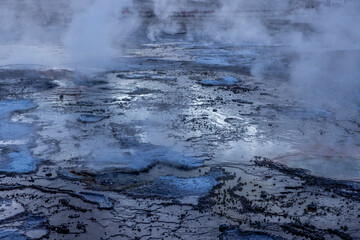 Exploring the fascinating geothermic fields of El Tatio with its steaming geysers and hot pools high up in the Atacama desert in Chile, South America