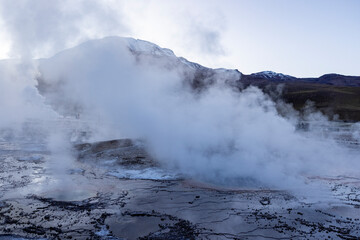 Exploring the fascinating geothermic fields of El Tatio with its steaming geysers and hot pools high up in the Atacama desert in Chile, South America